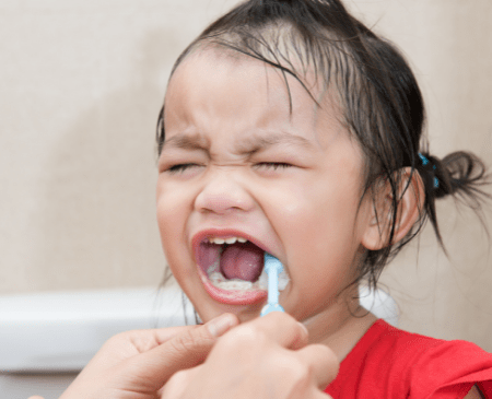 How to Help a Child Who Won't Brush Their Teeth